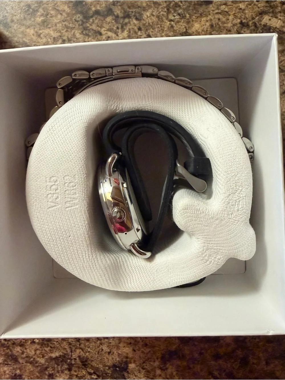 Fossil Q Wander Smartwatch with silicone and silver metal band and charger